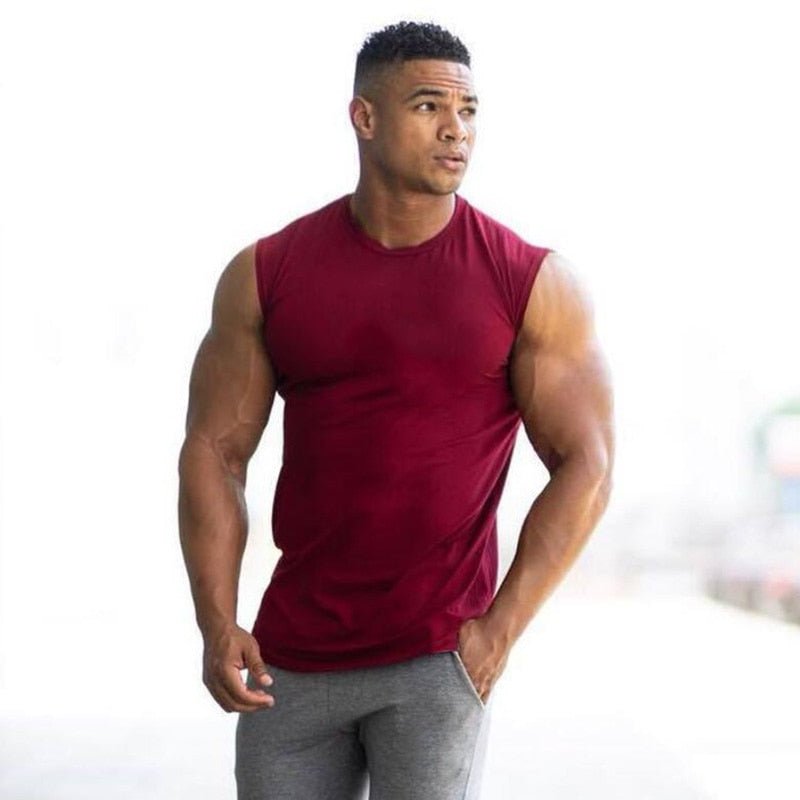 2021 Summer Newest Brand Mens Curved Hem Solid Color Gyms Stringers Vest Bodybuilding Clothing Fitness Man Tanks Tops - Yallafit